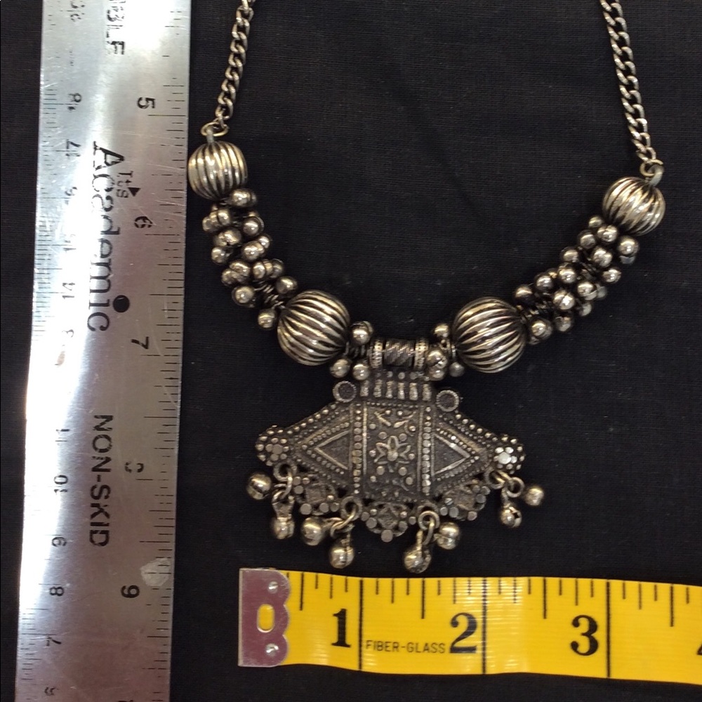 INDIAN VIBES in this very intricate metal necklace